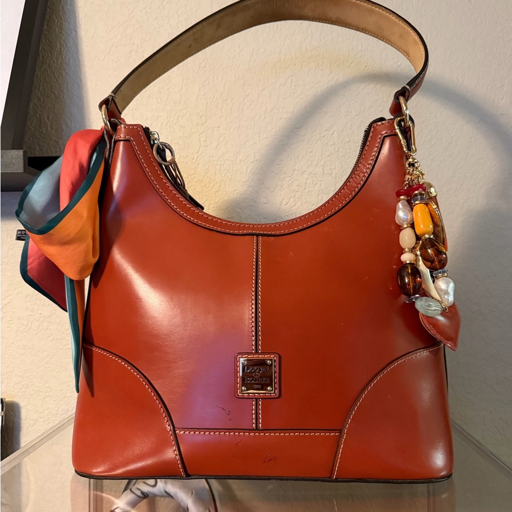 Dooney & Bourke Leather Shoulder Bag in Chestnut/Cognac leather.